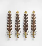 Gilbert Poillerat, Set of four wall ornaments