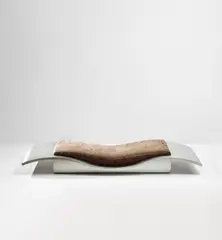 ‘Tapis Volant’ (Flying Carpet) daybed by Maria Pergay, circa 1968, Stainless steel, fabric, sold Oct 2019