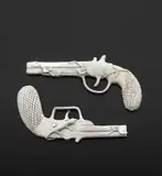 Two pistol-form sculptures by Gio Ponti, circa 1951, Glazed earthenware, sold Mar 2019