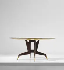 Gio Ponti, Dining table, circa 1951, East Indian rosewood-veneered wood, stained walnut, painted wood, glass, brass