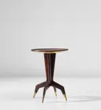 Side table by Gio Ponti, circa 1951, East Indian rosewood-veneered wood, stained walnut, painted wood, brass, sold Mar 2019