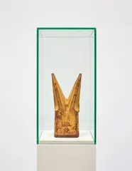 Untitled (Tooth) by Cyprien Gaillard, 2012, iron with glass vitrine and pedestal, sold Mar 2018
