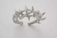 Tiara by Liza Lou, 2006, cast resin and quartz crystals, sold Apr 2018