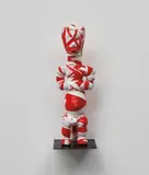 Kendell Geers, Twilight of the Idols (115), 2005, found object wrapped in chevron tape on artist's metal base