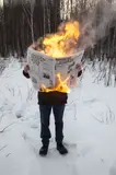 Tim Parchikov, Burning News, 2018, c-print, in artist's frame