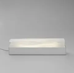 Zaha Hadid, Solid (Edition No. 31), 2005, Vacuum cast polyurethane resin, with accompanying light-box,