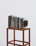 Book Cam 2 by Taiyo Onorato & Nico Krebs, 2013, Unique work, comprising books, camera lens, film compartment and wood. With original wood stand, sold May 2018