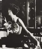 Lillian Bassman, Across the Restaurant, Barbara Mullen, dress by Jacques Fath, Le Grand Véfour, Paris