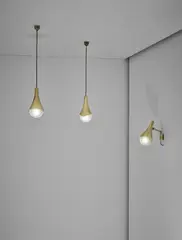 Adjustable wall light and pair of ceiling lights, model no. 1849 by Max Ingrand, circa 1958, Tubular brass, brass, opaque glass, sold Apr 2018