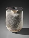 'Sack' form with disc by Hans Coper, circa 1972, Stoneware, layered white porcelain slips and engobes over a body with textured and incised linear designs, the interior , sold Apr 2018