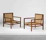 Pair of armchairs by Joaquim Tenreiro, circa 1958, Brazilian rosewood, cane, sold Apr 2018