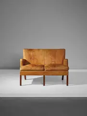 Two-seater sofa, model no. 5313 by Kaare Klint, designed 1936, executed 1960, Niger leather, Cuban mahogany, offered Apr 2018