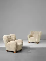 Märta Blomstedt, Pair of armchairs, designed for the Hotel Aulanko, Hämeenlinna, Finland, designed 1939, Birch, sheepskin