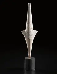 Hans Coper, Cycladic arrow form, 1970, stoneware, layered white porcelain slips and engobes over a body with textured and incised linear designs, the base with a black glaze over a textured body