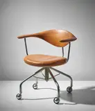 Hans J. Wegner, Swivel armchair, model no. JH502, circa 1955, Teak, chromium-plated metal, leather, acrylic