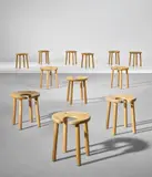 Antti Nurmesniemi, Set of twelve 'Sauna' stools, designed for the Palace Hotel, Helsinki, designed 1952, produced 1980s, Laminated-birch plywood, teak, stained birch