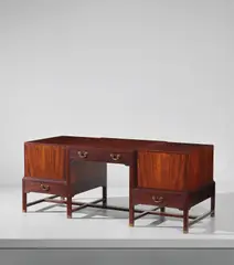 Kaare Klint, Unique desk, designed for the Chairman’s Office, Society of Wholesalers, Copenhagen, 1928, Cuban mahogany-veneered wood, brass