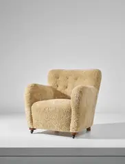 'Third' armchair by Flemming Lassen, circa 1935, Sheepskin, Cuban mahogany, Cuban mahogany-veneered wood, bronze, sold Oct 2018