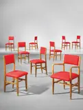 Gio Ponti, Set of eight side chairs and one armchair, designed for the public administration offices, Forlì, circa 1950, Walnut, fabric, brass