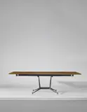 Gio Ponti, Rare extendable dining table, from an interior of an apartment block designed by the architect, Milan, circa 1958, Walnut-veneered wood, painted steel, painted brass, brass