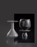 Cup on stand with central disc by Hans Coper, circa 1965, Stoneware, black glaze, offered Oct 2018
