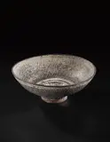 Monumental 'knitted' bowl by Lucie Rie, circa 1976, Stoneware, inlaid with manganese beneath grey, sold Oct 2018