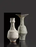 Vase with fluted body by Lucie Rie, circa 1978, Stoneware with white pitted glaze, sold Oct 2018