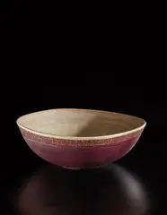 Serving dish by Lucie Rie, late 1940s, Stoneware, interior with white glaze, exterior with matt terracotta glaze with sgraffito around rim, offered Oct 2018
