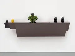 Haim Steinbach, Untitled (hulk), 2009, plastic laminated wood shelf, small rubber dog chew, plastic lemon/lime saver, polystone 'Hulk' bust, 2 large rubber dog chews