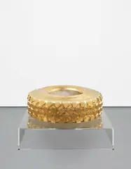Sylvie Fleury, (Gold) Fountain LKW, 2003, gold-plated porcelain tire, technical equipment for fountain installation, acrylic and glass pedestal