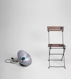 Marcel Broodthaers, Lampe Bleu et Chaise, 1969, photographic lamp with blue bulb, metal reflector, chair and black paper