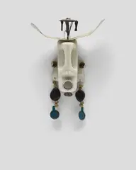 Romuald Hazoumè, Untitled, painted plastic bottle, wooden beads, plastic, straw, shells and metal