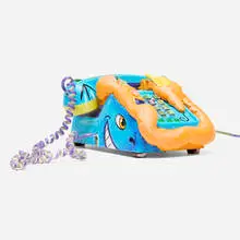 Kenny Scharf, Telephone, 1995, painted plastic telephone, painted polyurethane foam, applied media, printed plastic