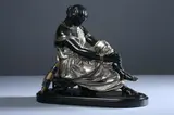 James Pradier, The Seated Sappho, Tri-tone patinated bronze; on a marble base