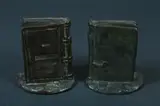 Charles Austin Heedham, Book-form bookends, Bronze; signed Needham with copyright logo
