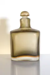 Paolo Venini (Italian by Paolo Venini, 1895, an 'Inciso' glass stoppered bottle, sold Jul 2023