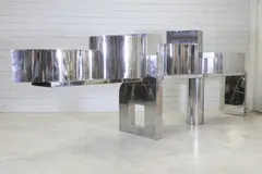 Prospero Rasulo, Prospero Rasulo (Italian, 1953, a brutalist stainless steel 'Amico' console table