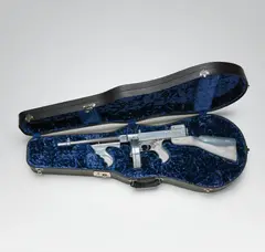 14th February 1929 by Clive Barker, 2000, Aluminium replica Tommy gun, contained in a blue velvet-lined instrument case, sold Jun 2017