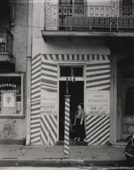 Sidewalk and Shopfront, New Orleans by Walker Evans, 1935, Gelatin silver print, probably printed 1960s, offered May 2017