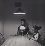 Carrie Mae Weems, Untitled (Woman and daughter with makeup) from Kitchen Table Series, 1990, Gelatin silver print, mounted to board