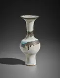 Bottle vase with flaring lip by Lucie Rie, 1985, Stoneware, inlaid shoulder and lip, gold bands and matt white glaze, sold Apr 2017