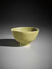 Green bowl by Lucie Rie, circa 1968, Porcelain, acid green glaze, sold Apr 2017