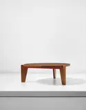 Low table, model no. GB 21 by Jean Prouvé, circa 1949, Mahogany, painted steel, sold Apr 2017