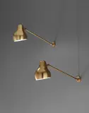 Vilhelm Lauritzen, Pair of adjustable wall lights, designed for the Radiohuset (National Broadcasting House), Copenhagen, circa 1942, Tubular brass, brass, painted brass