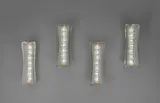 Set of four wall lights, model no. 1568 by Max Ingrand, circa 1956, Opaque partially-chiseled glass, brass, nickel-plated brass, sold Apr 2017