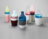 Hella Jongerius, Set of six 'Groove' and 'Long Neck' bottles, 2008, Porcelain, coloured and clear glass, tape