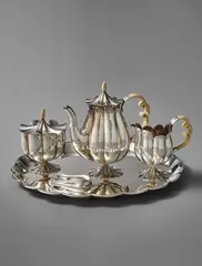 Tea service, model no. S se 8, comprising model nos. S 5369 - S se 8-1, S 5370 - S se 8-2, S 5371 - S se 8-3, S 5372 - S se 8-4, S 5373 - S se 8-5 by Josef Hoffmann, designed 1922, executed 1923-1926, Precious metal, ivory, sold Apr 2017