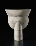'Thistle' form by Hans Coper, circa 1975, Stoneware, layered white porcelain slips and engobes over a body with textured and incised linear designs, the interior , sold Sep 2017