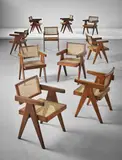 Ten armchairs by Pierre Jeanneret, 1955-1956, Teak, cane, sold Sep 2017