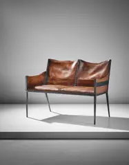 Rare two-seater settee by Jean-Michel Frank, circa 1936, Wrought iron, leather, sold Sep 2017